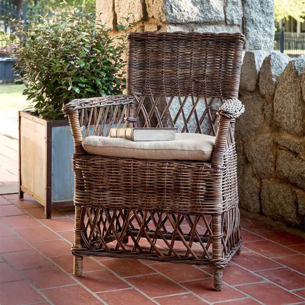 Woven rattan chair for a vintage farmhouse porch