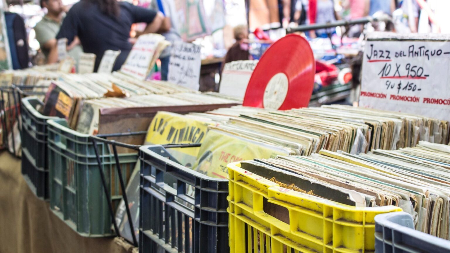 A Lively 1980s Record Store With Shelves Full Of Vinyl Records And Cassette Tapes: Nostalgia Myths Debunked