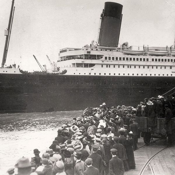RMS Titanic departing Southampton in April 1912 as crowds watch from shore