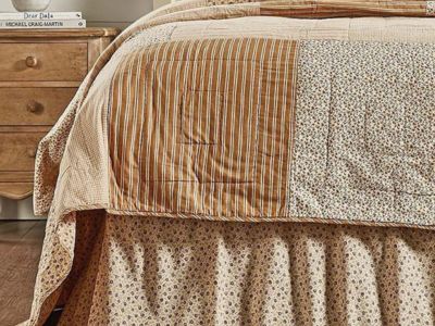 Country floral bed skirt with warm neutral farmhouse pattern