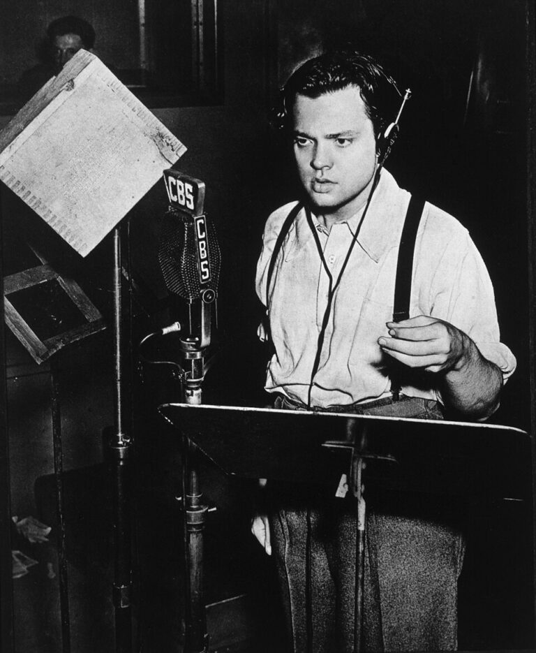 Orson Welles at a CBS microphone in 1938