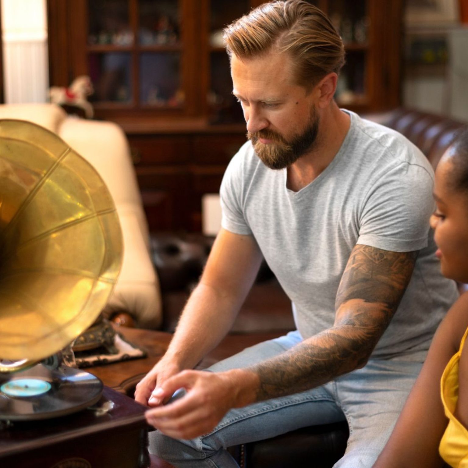Salesman Showing Gramophone To A Customer Salesman Showing Gramophone To A Customer