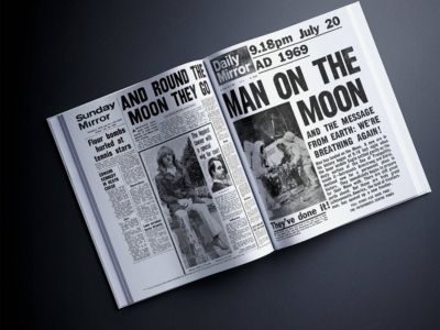 The Story of the Moon Landings newspaper book showing 1969 moon landing headlines